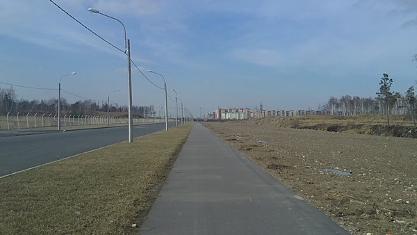 22042012708.JPG (619.51 КБ) 4847 просмотров Вид на север, из Пушкинского в Фрунзенский район, вдоль Автозаводского проезда, слева за забором территория завода General Motors, справа место под ст.Шушары и депо.